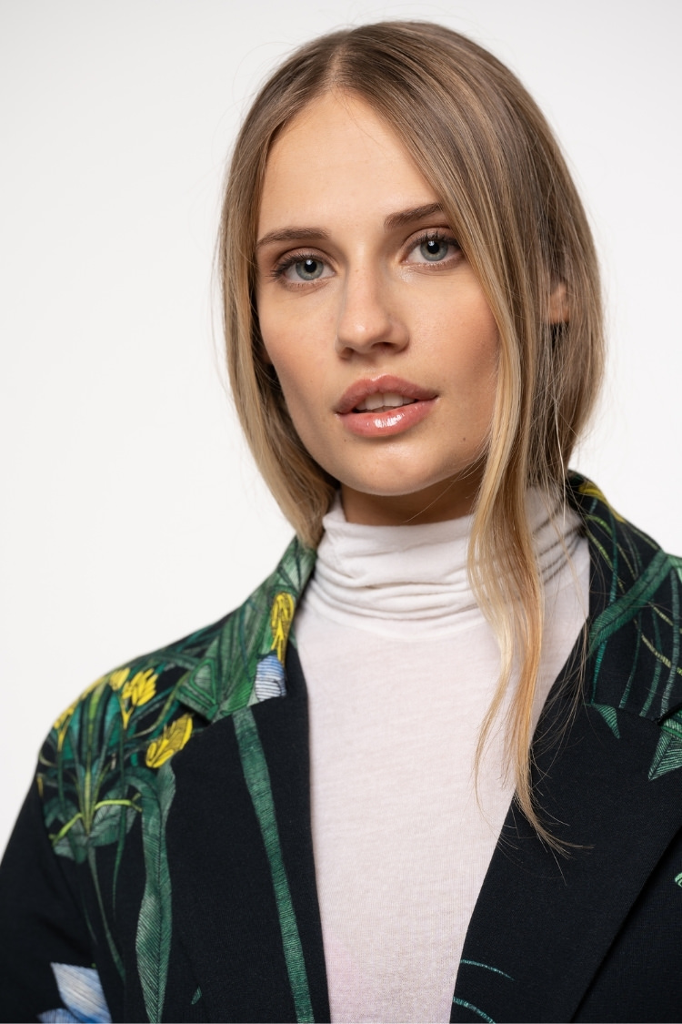 LAURA B.